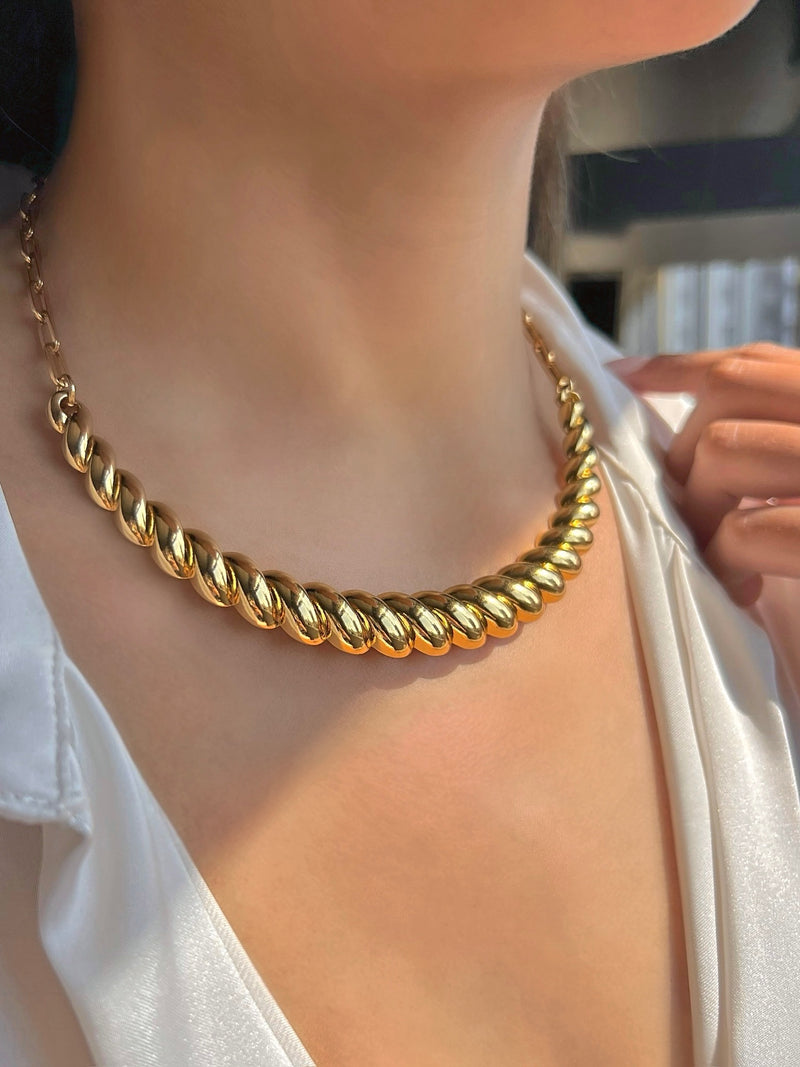 Arco Joice Volta Torcida Banho Ouro 18k