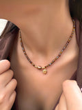 Colar Mix Tons Marrons Com Pérola Natural e Sol 40cm