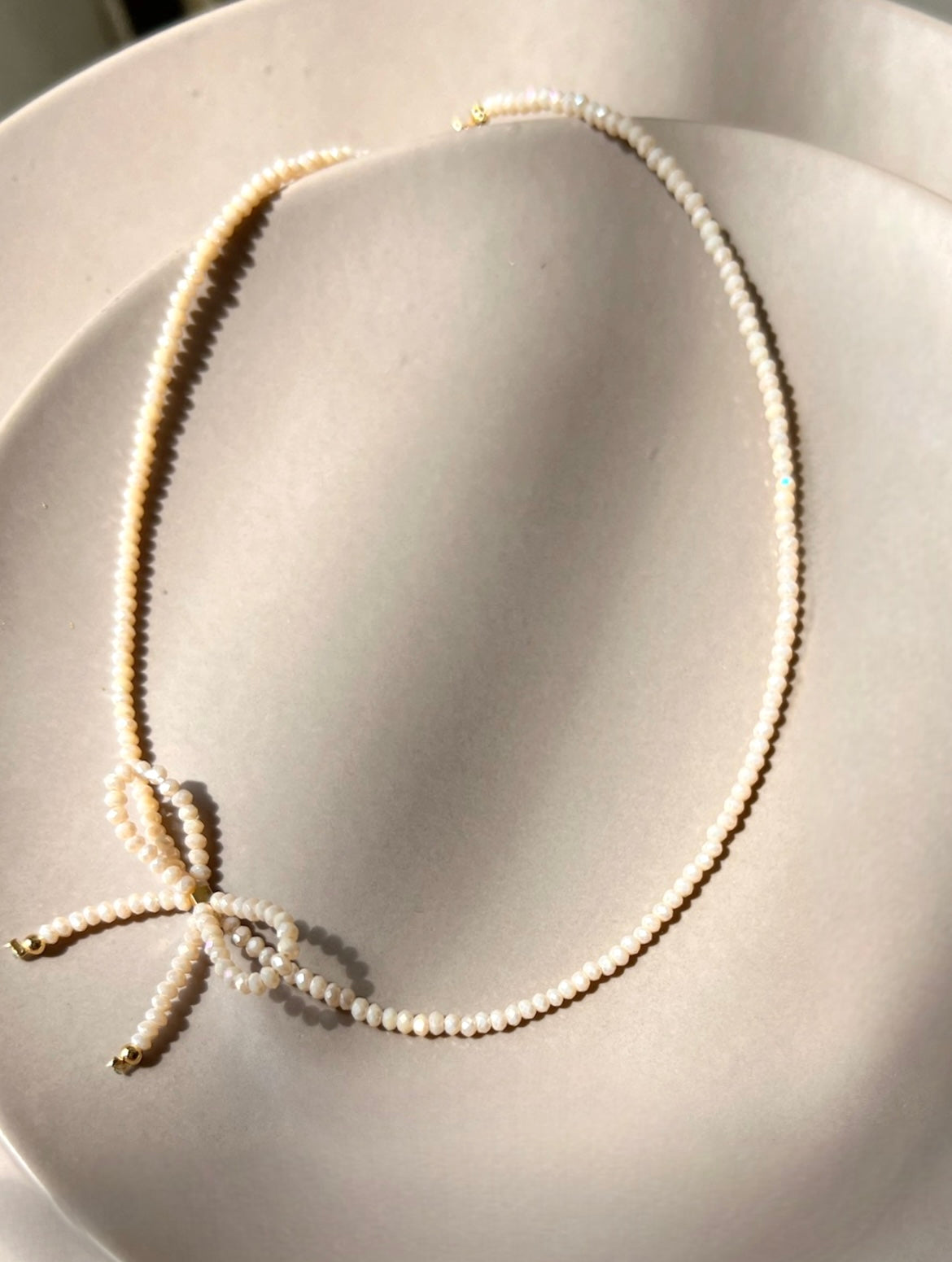 Choker Mini Laço Nude 38 cm