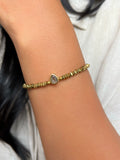 Pulseira Hematita Ouro Com Gota Cinza Fumê 16cm