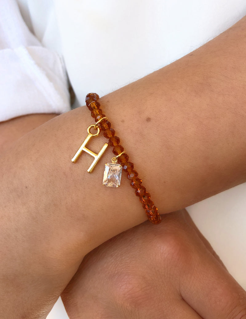 Pulseira De Cristais Lapidados Cor Caramelo Personalizado Letra Média Com Baguete Zircônia