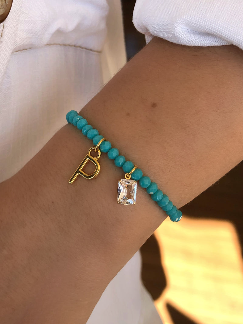 Pulseira De Cristais Lapidados Cor Turquesa Personalizado Letra Média Com Baguete Zircônia
