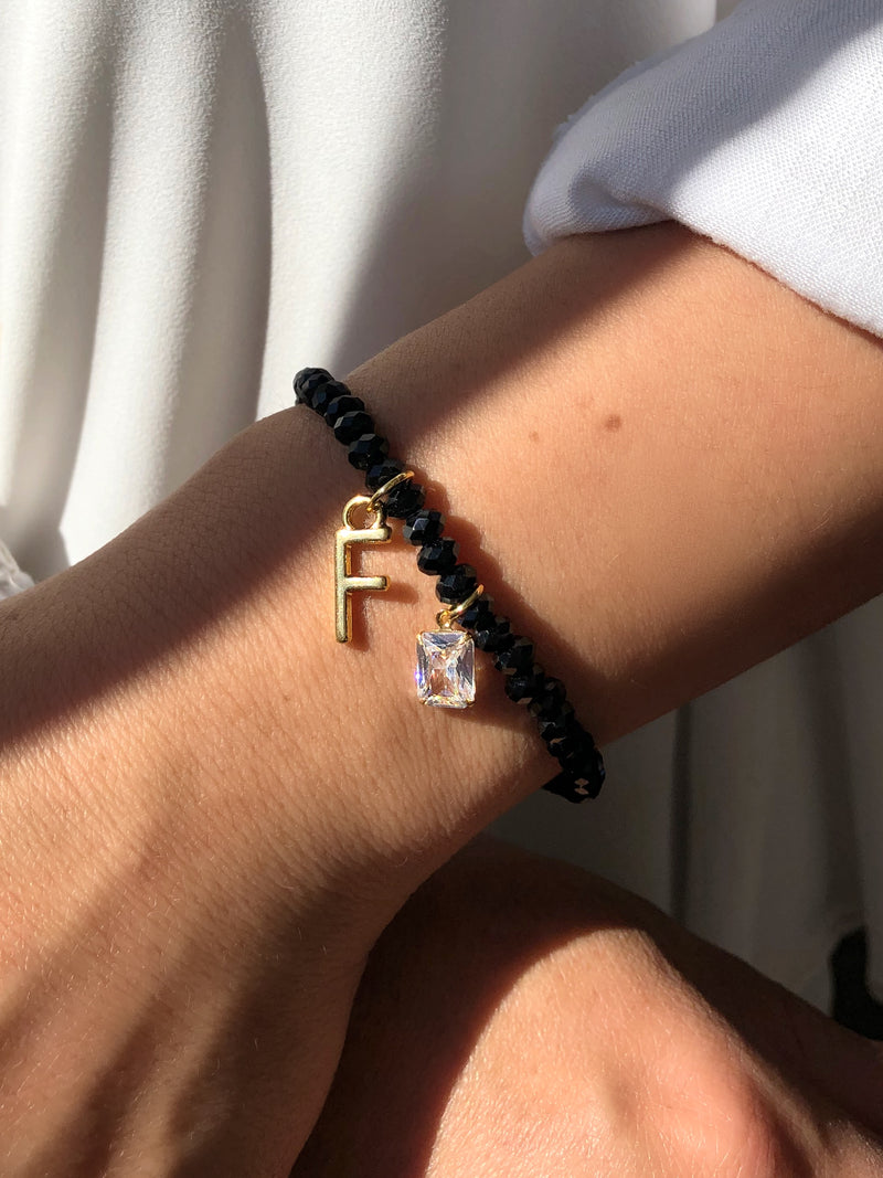 Pulseira De Cristais Lapidados Cor Ônix Personalizado Letra Média Com Baguete Zircônia
