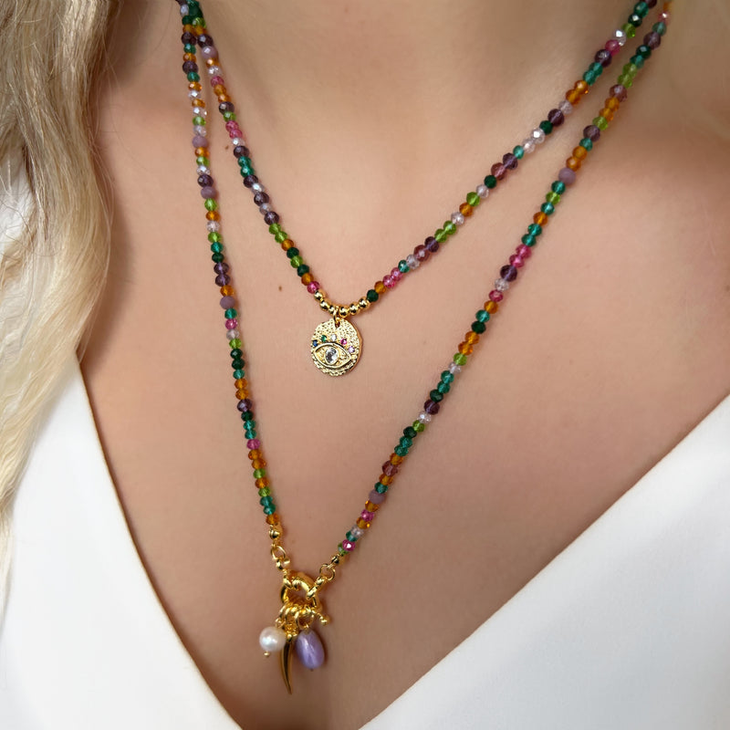 Mix de colares tons roxo e medalha olho grego