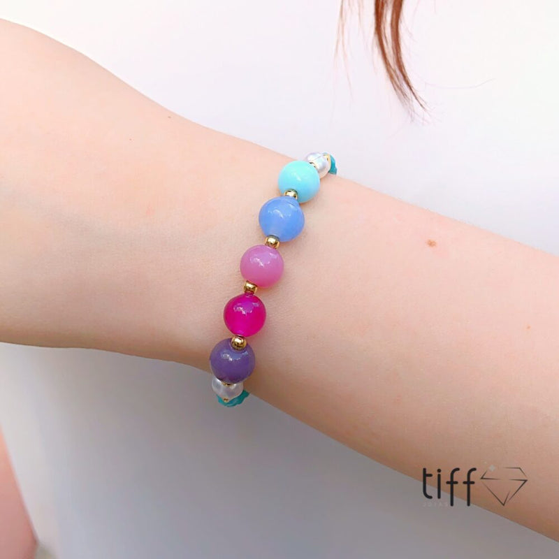 Pulseira cristais azul turquesa, pedras coloridas e detalhes em banho ouro 18k