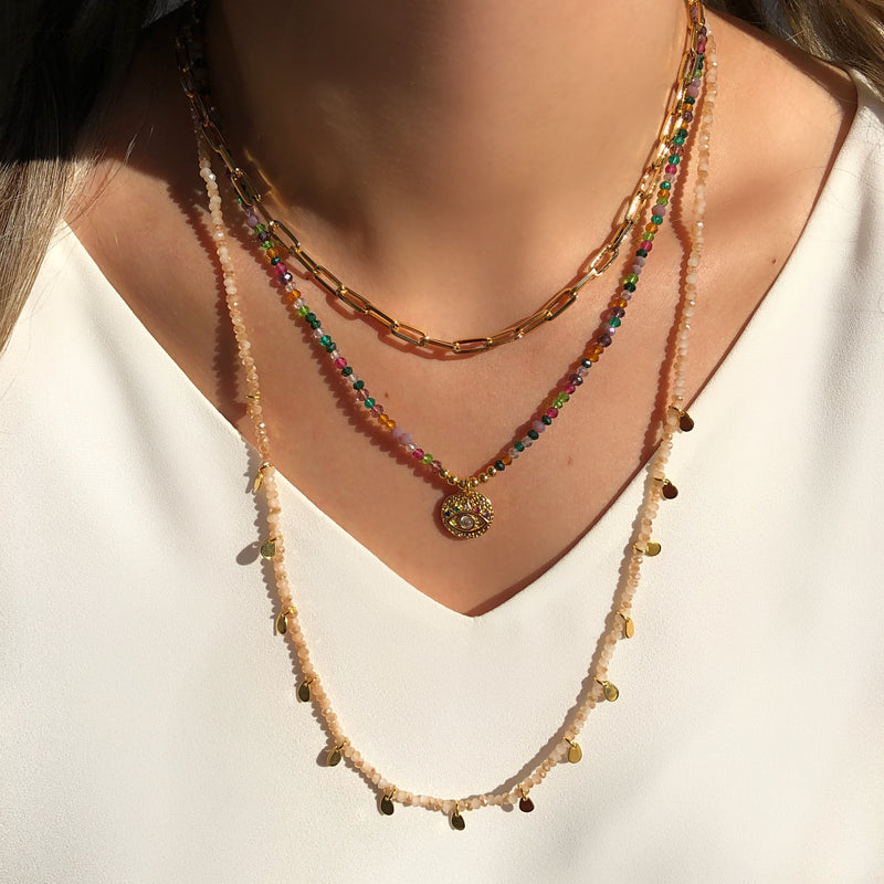 Mix de colares coloridos tons roxos e medalha olho grego