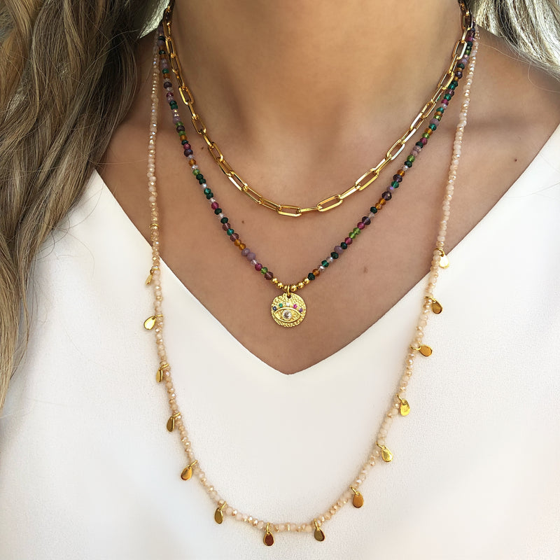 Mix de colares coloridos tons roxos e medalha olho grego