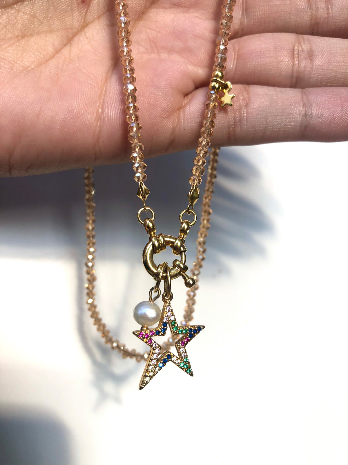 Colar Cristais Lapidados Cor Dourado Com Pingente Estrela Cravejada Com Micro Zircônias