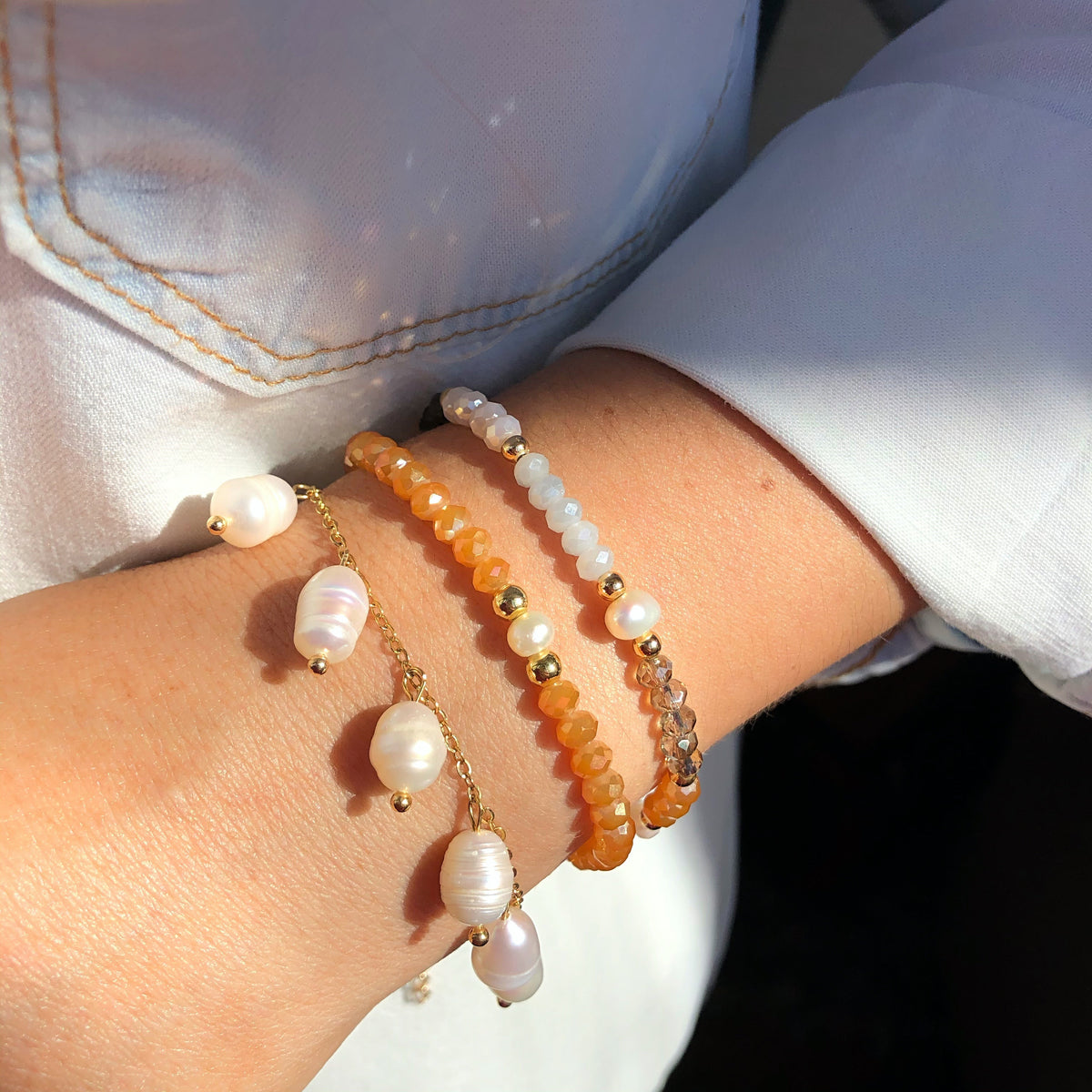 Mix de pulseiras cristais laranja e pérola água doce - Tiff Joias